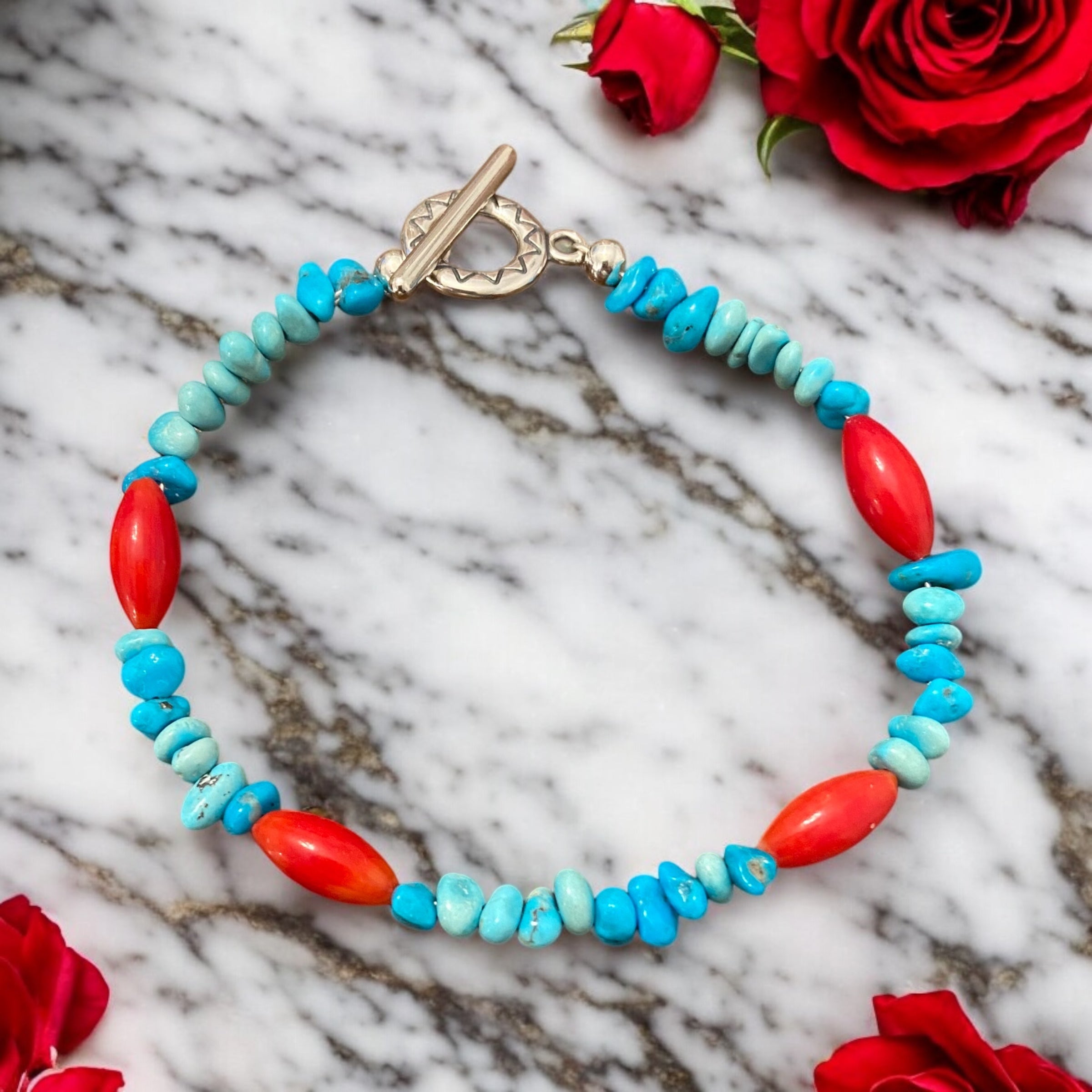 turquoise and red coral styled