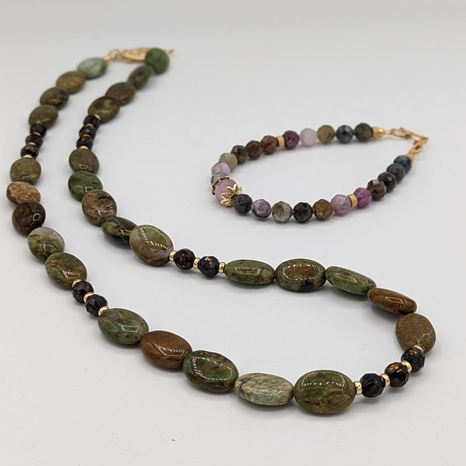 Australian opal necklace pictured with sapphire bracelet