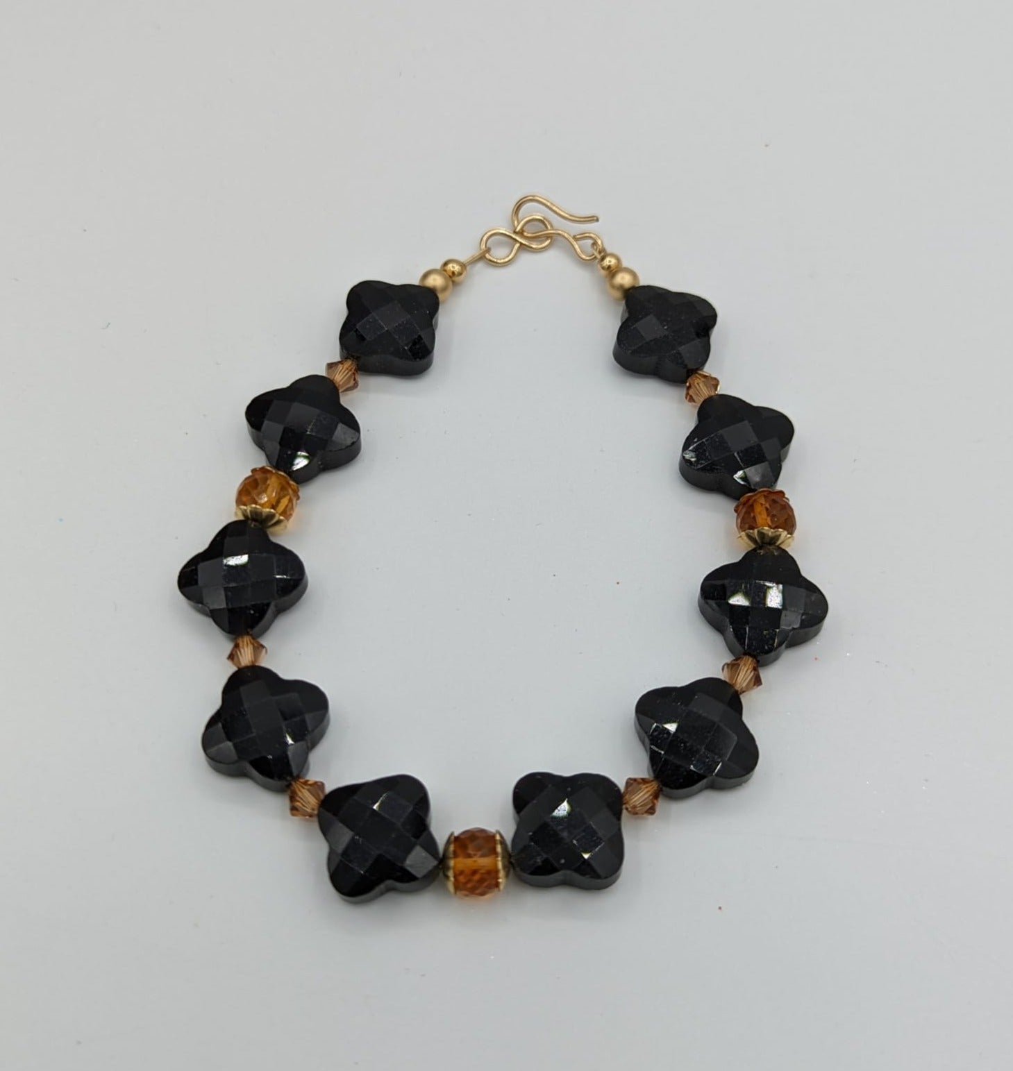 black agate and citrine bracelet on white background