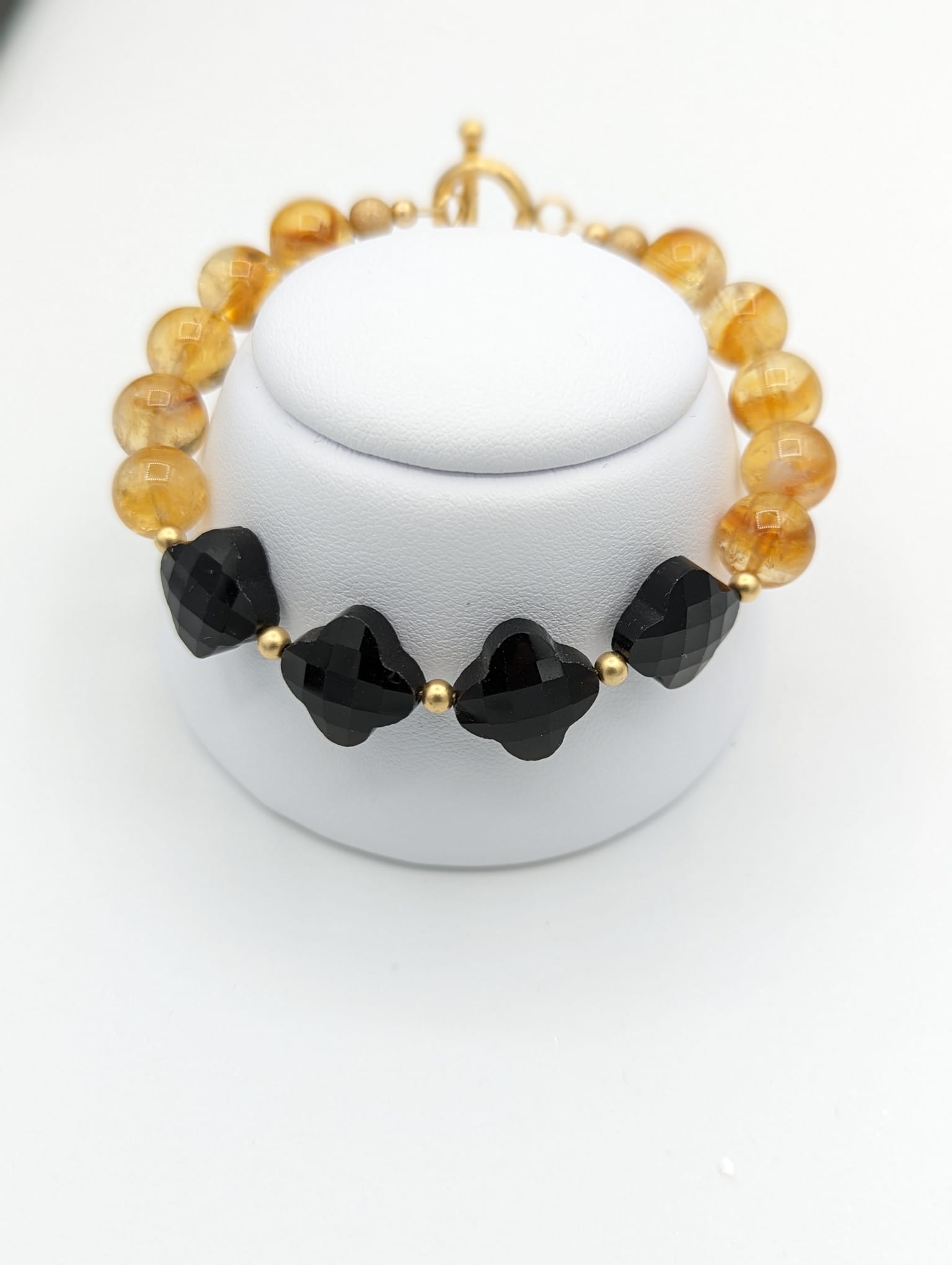 black agate and citrine bracelet on stand