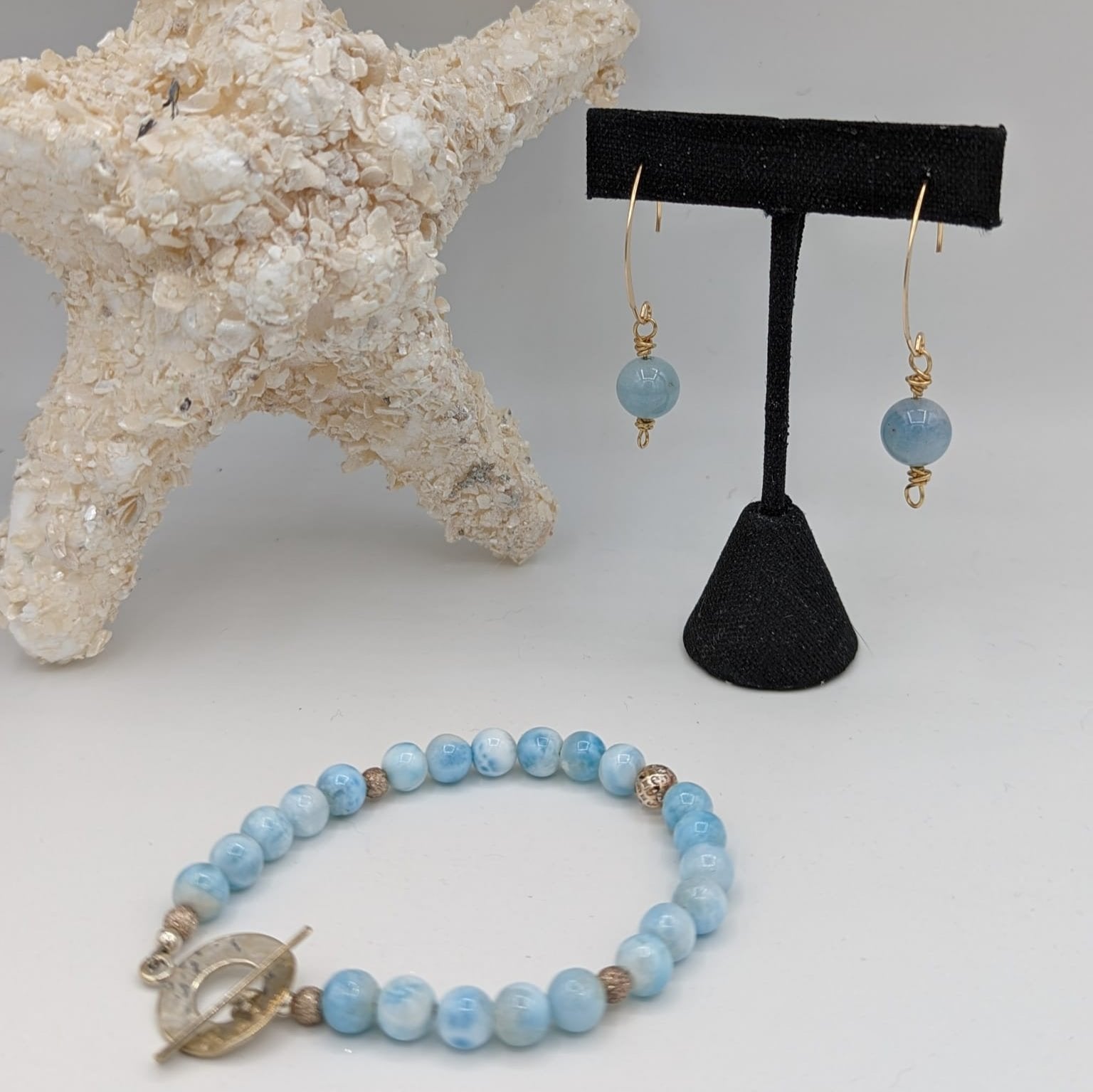 blue aquamarine styled with an larimar and sterling silver bracelet