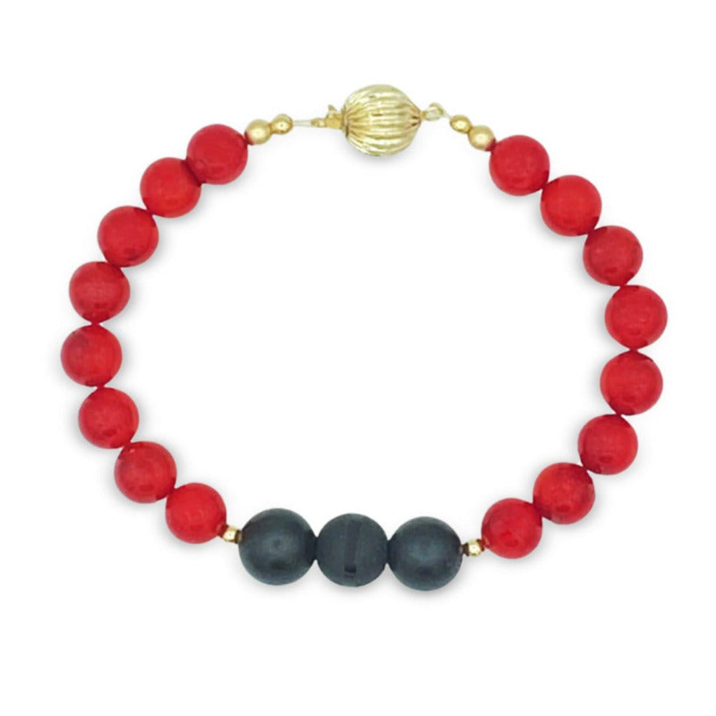 red coral and black onyx bracelet 7 1/4”