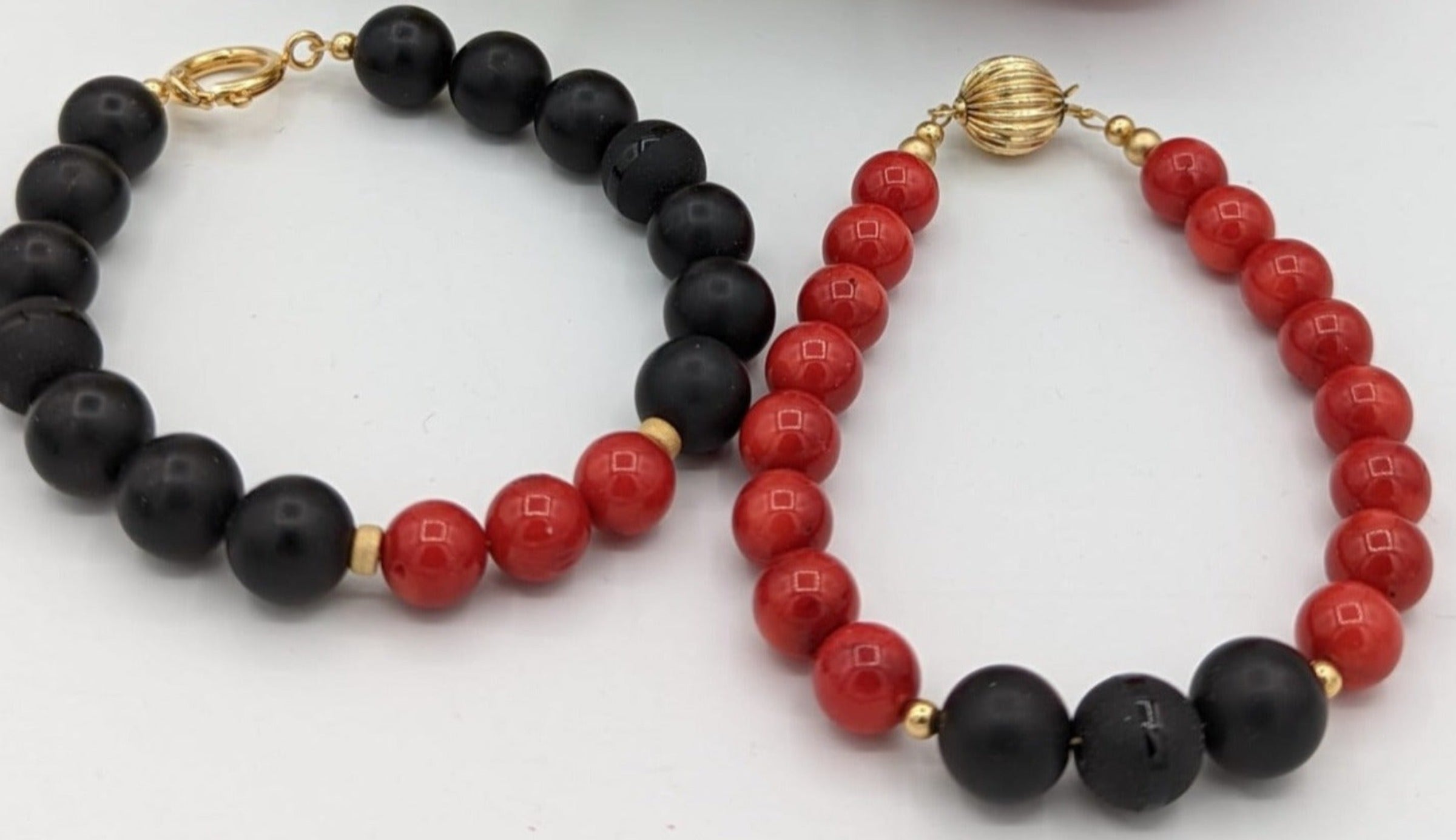 red coral and onyx-styled bracelets