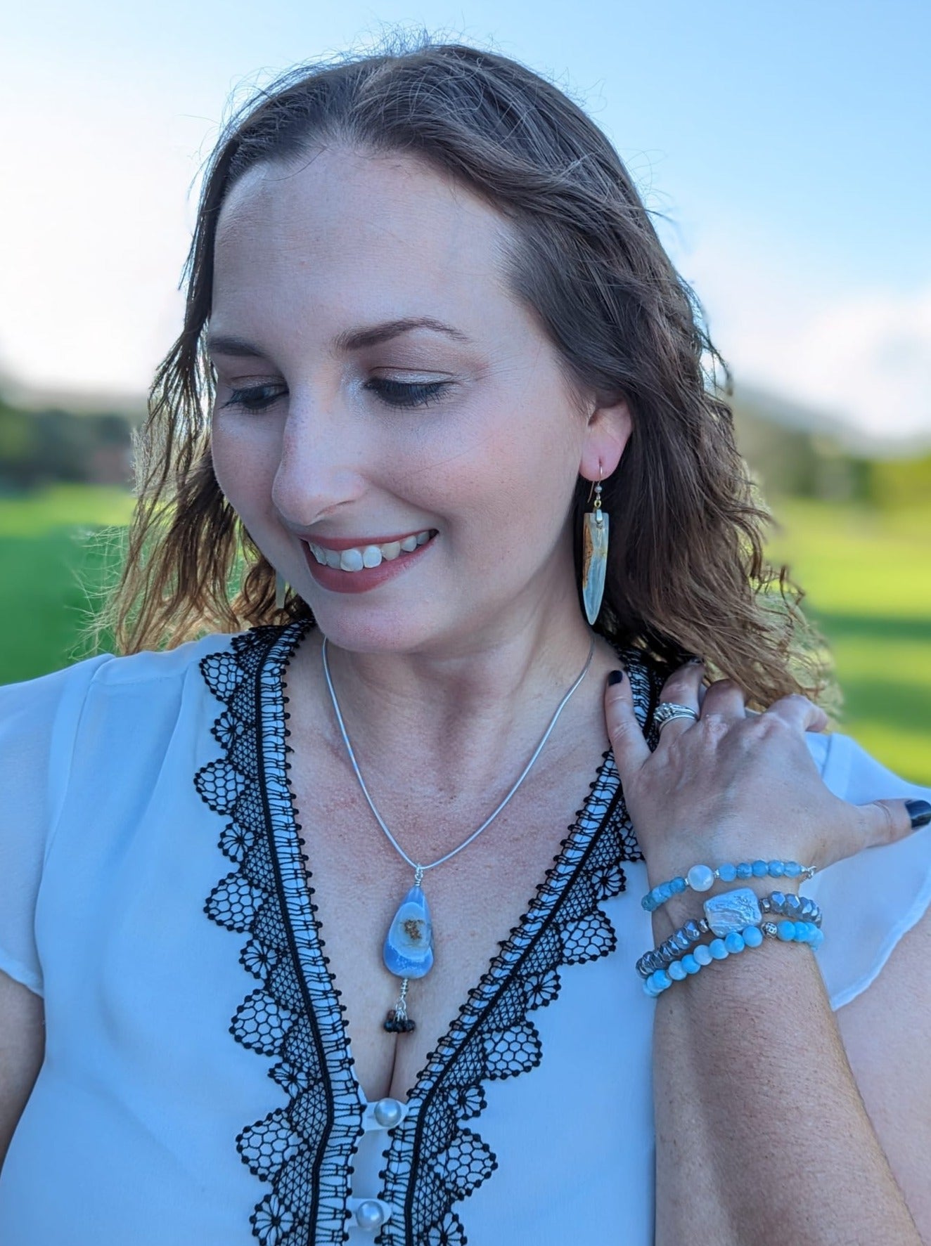 styled Lemurian Aquatine earrings