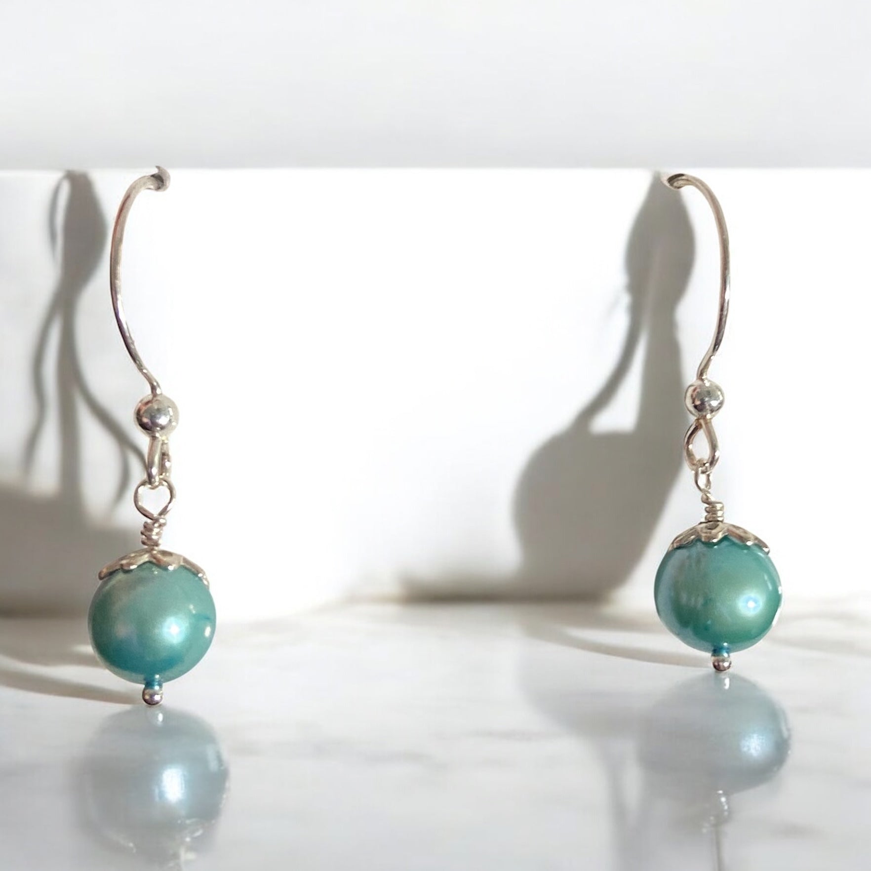 Whispers of Teal: Luminous Freshwater Pearl Drop Earrings – Sterling Silver