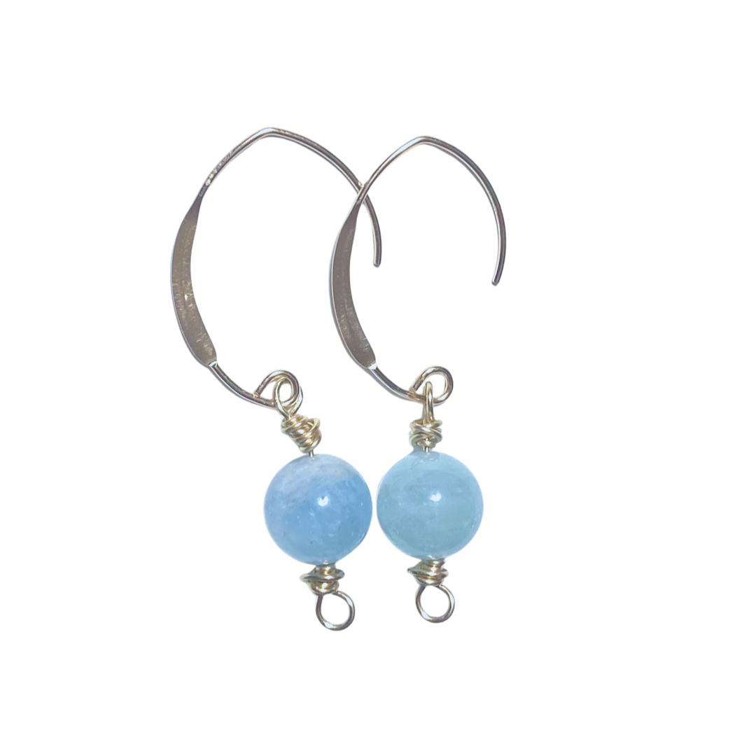 blue aquamarine earrings close up